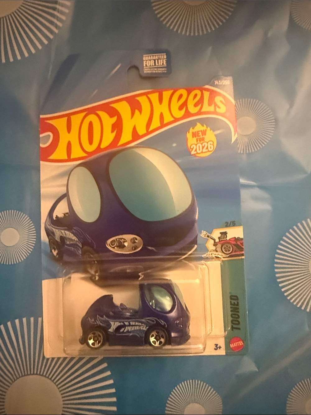 Hot Wheels Tooned Blue Collectible Toy Car - 2026 Edition